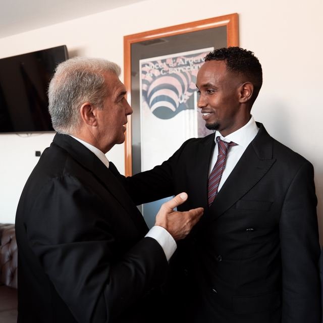 Nasir Hassan greeting the President of FC Barcelona